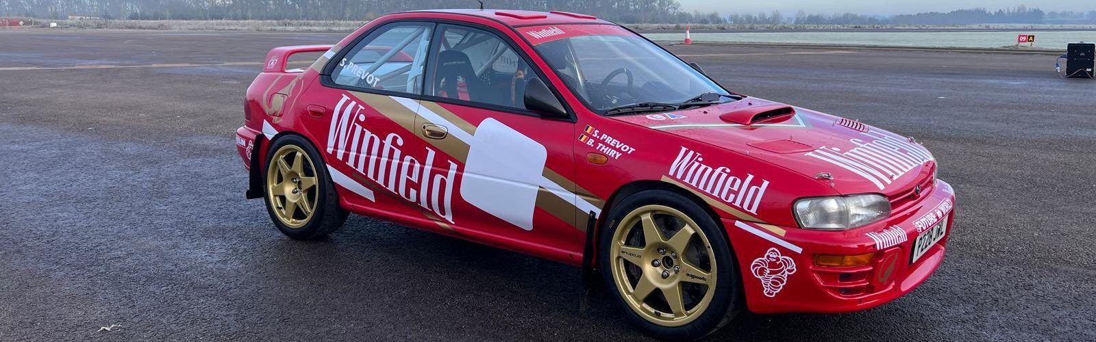 Inside the rebuild of a rare red Subaru Impreza 555 – DirtFish